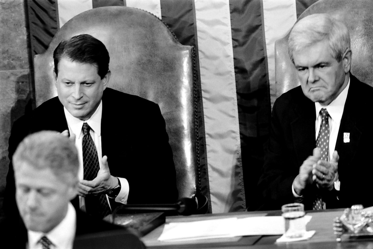Vice President Al Gore and Speaker of the House Newt Gingrich applaud during President Bill Clinton's State of the Union address.