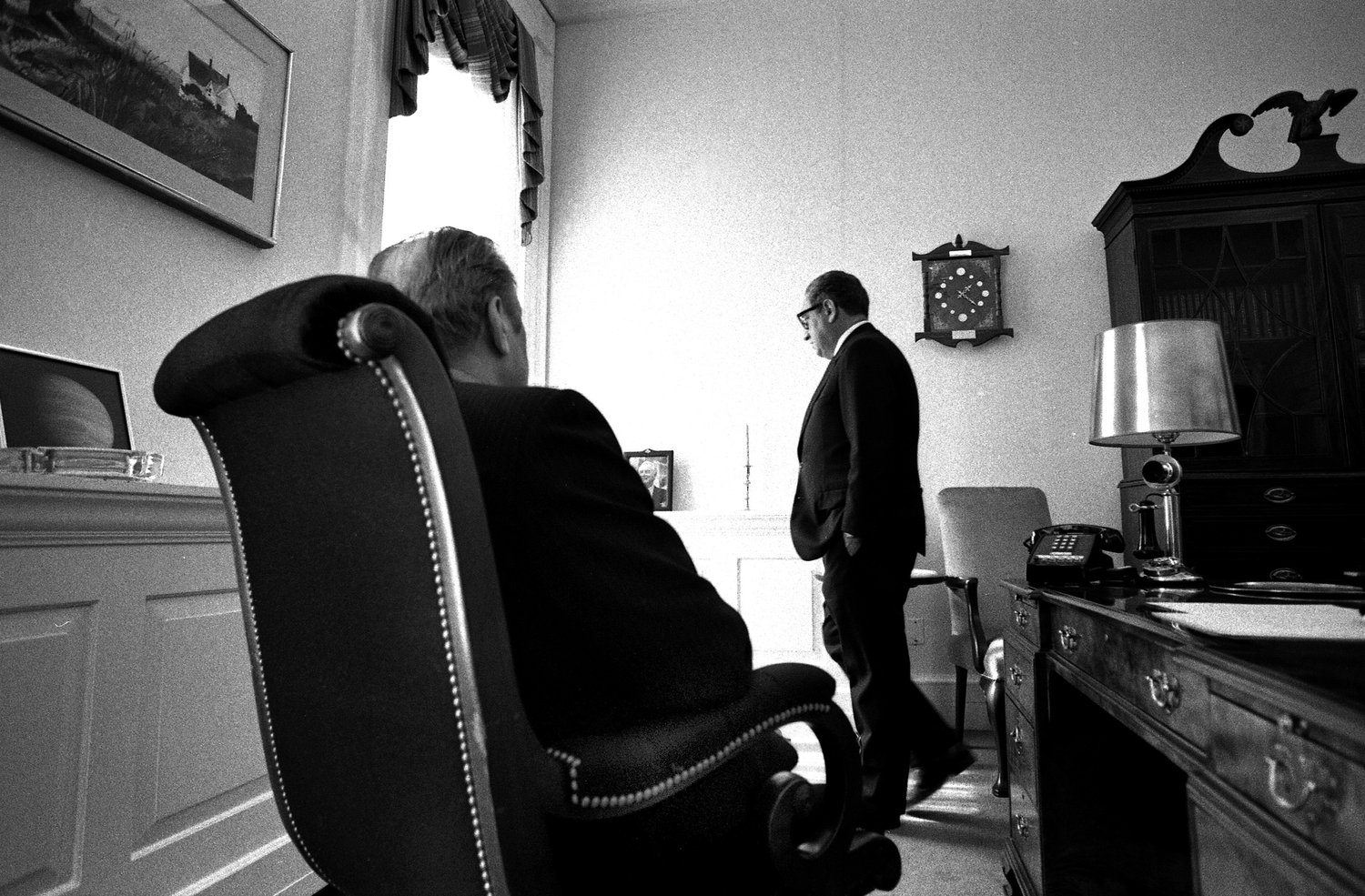 President Gerald R. Ford with Secretary of State Henry Kissinger in the President's private office at the White House to discuss the deteriorating situation in South Vietnam and the lack of Congressional support for more U.S. aid. The North Vietnamese had just started their attack against South Vietnamese positions in the Central Highlands.