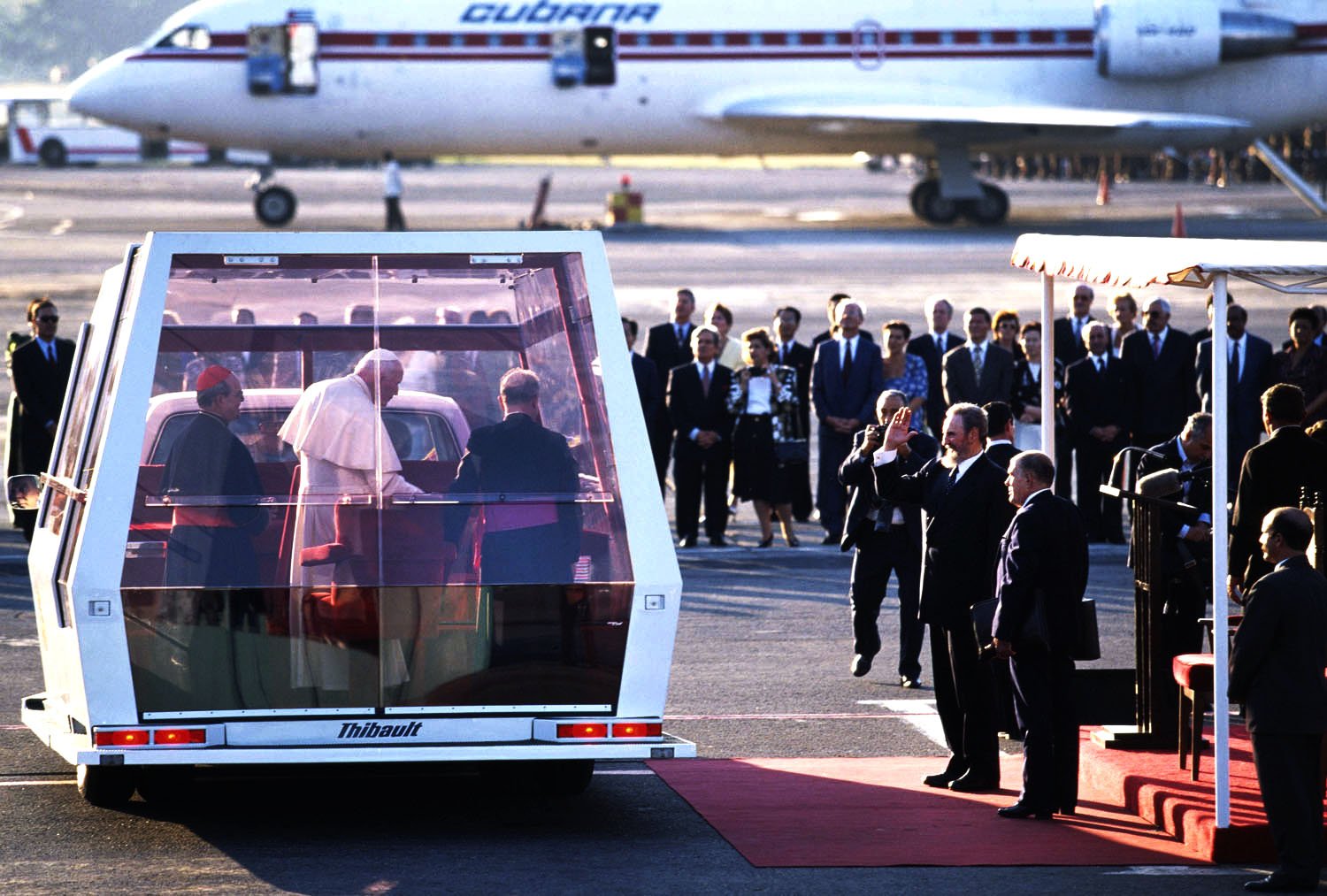 Pope John Paul II is greeted at the airport by Cuban President Fidel Castro during the arrival ceremony in Havana, Cuba.